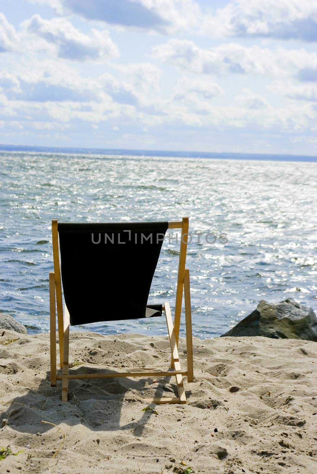 black chair on the beach 