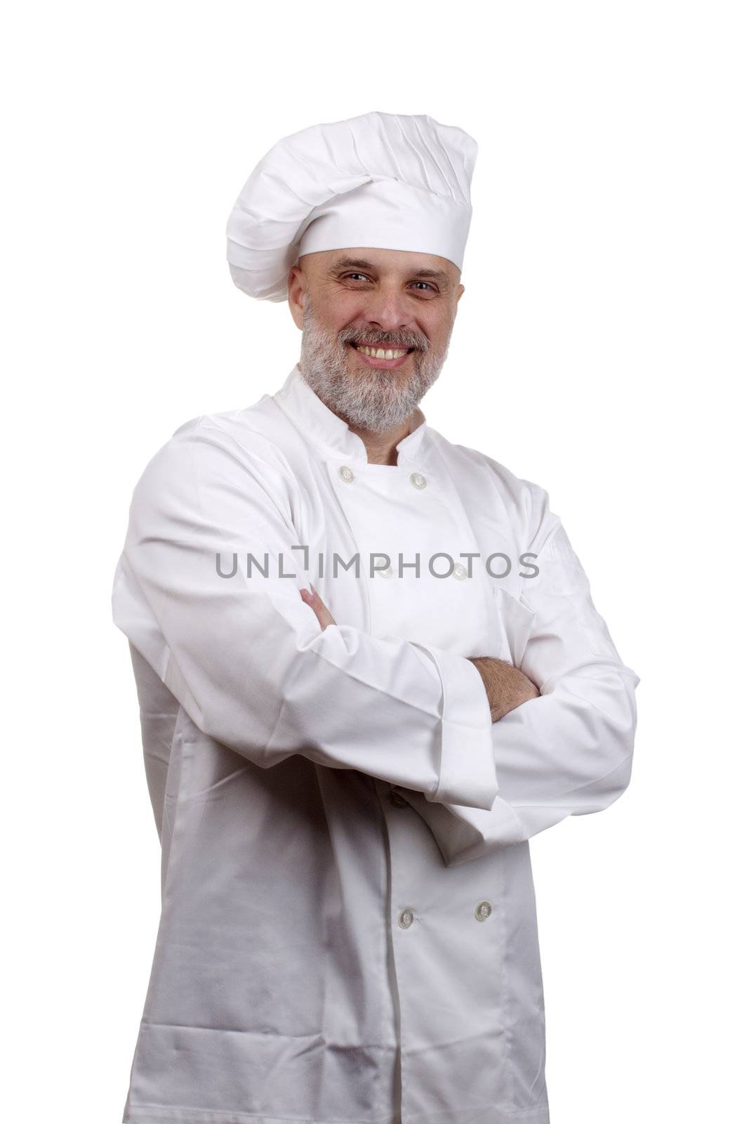 Portrait of a happy chef in a chef's hat and uniform isolated on a white background.