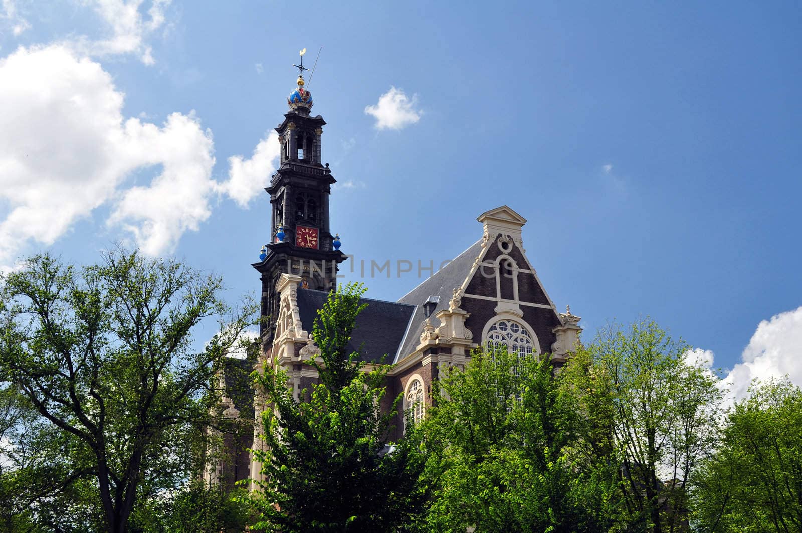 Tower of the historic Westerkerk (Western church) in Amsterdam, Netherlands.