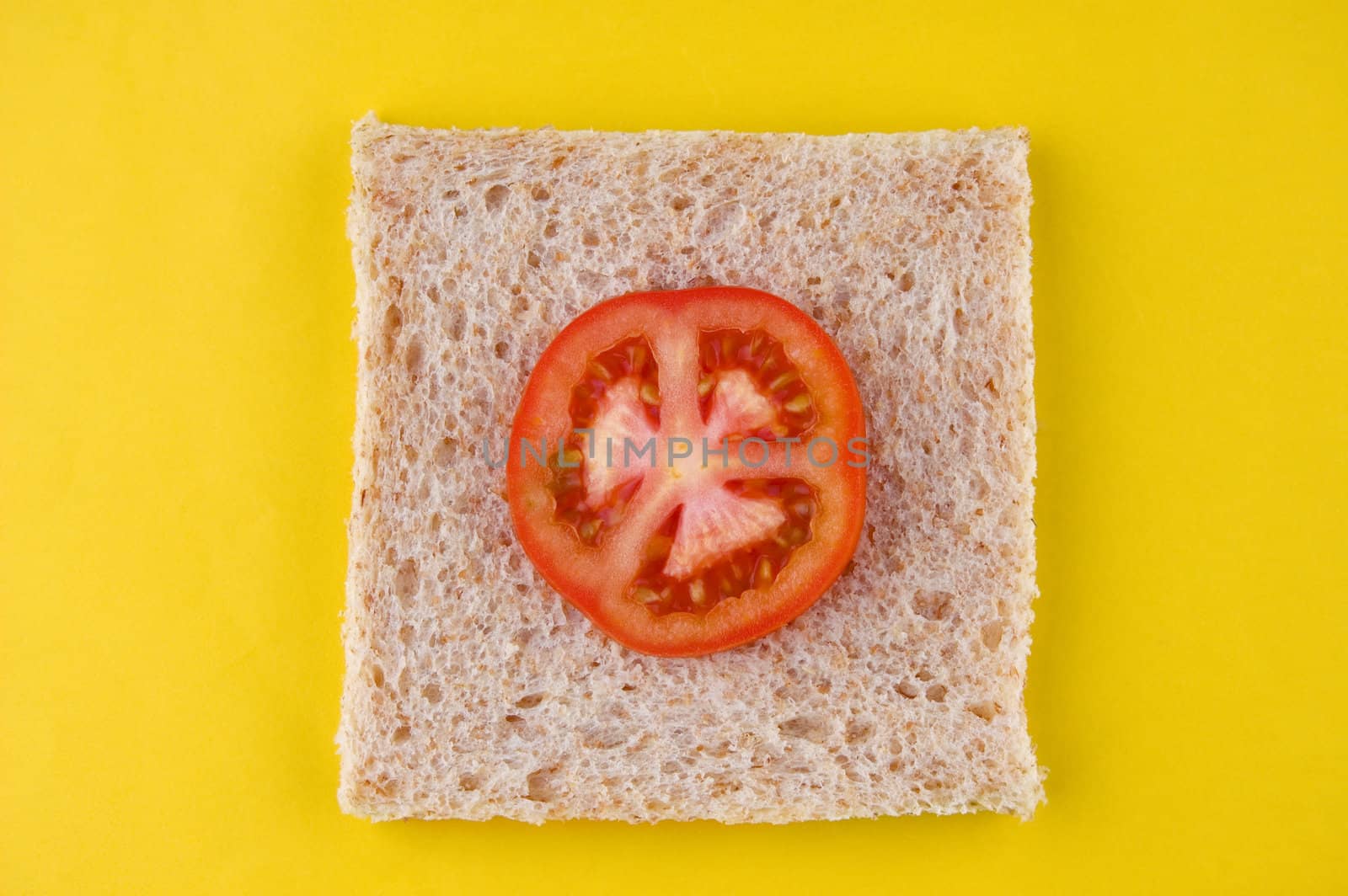diet concept photo, wholewheat bread with a slice of tomato