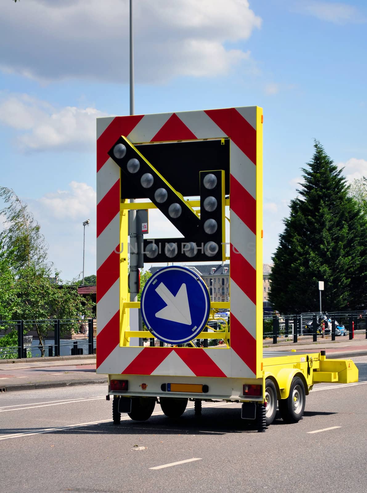 Lane closed trailer with arrow indicating road work