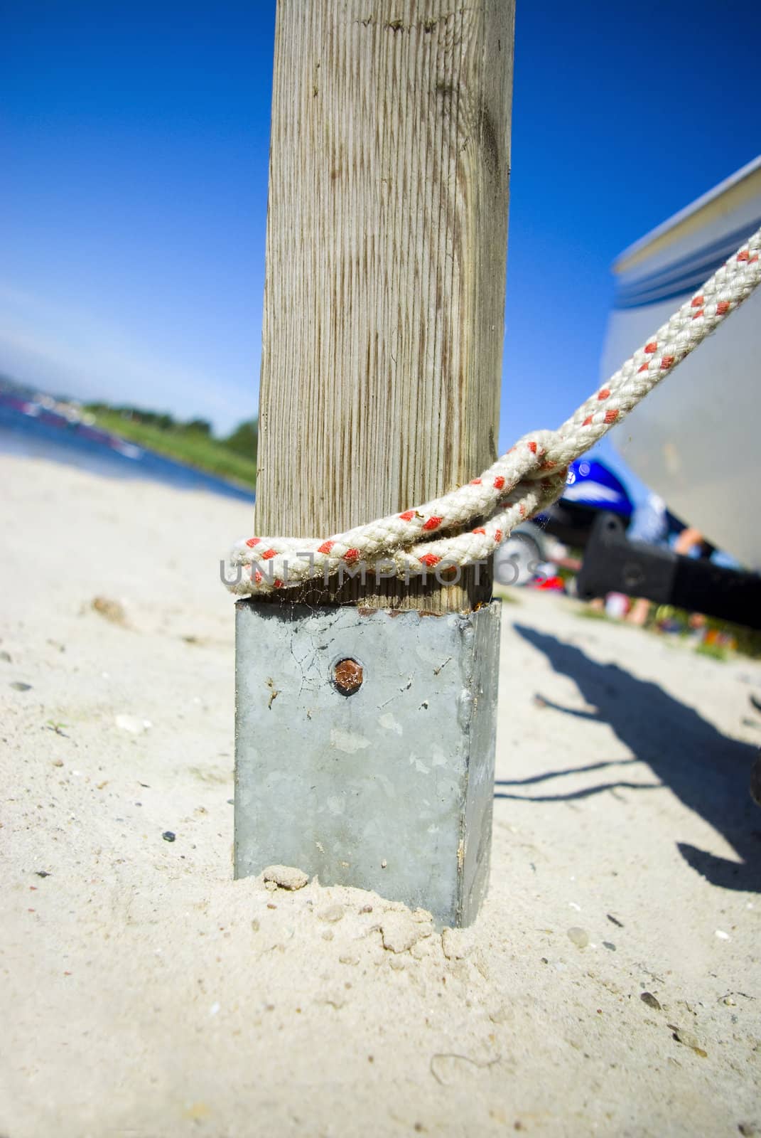 wooden pile with rope