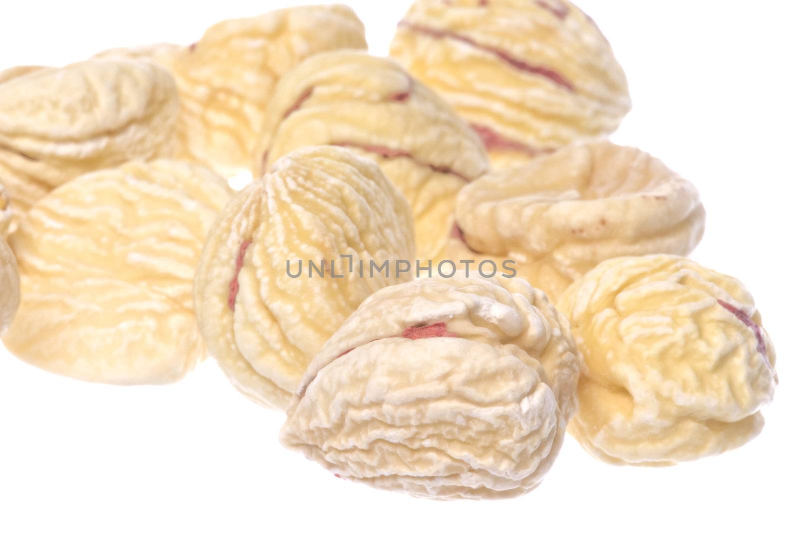 Isolated macro image of dried chestnuts.