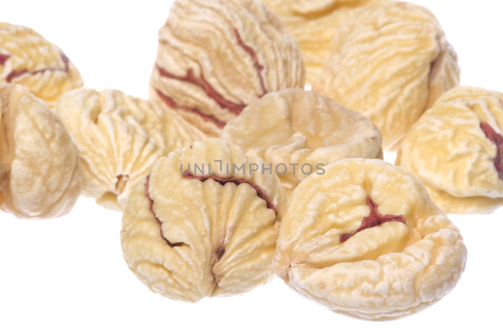 Isolated macro image of dried chestnuts.