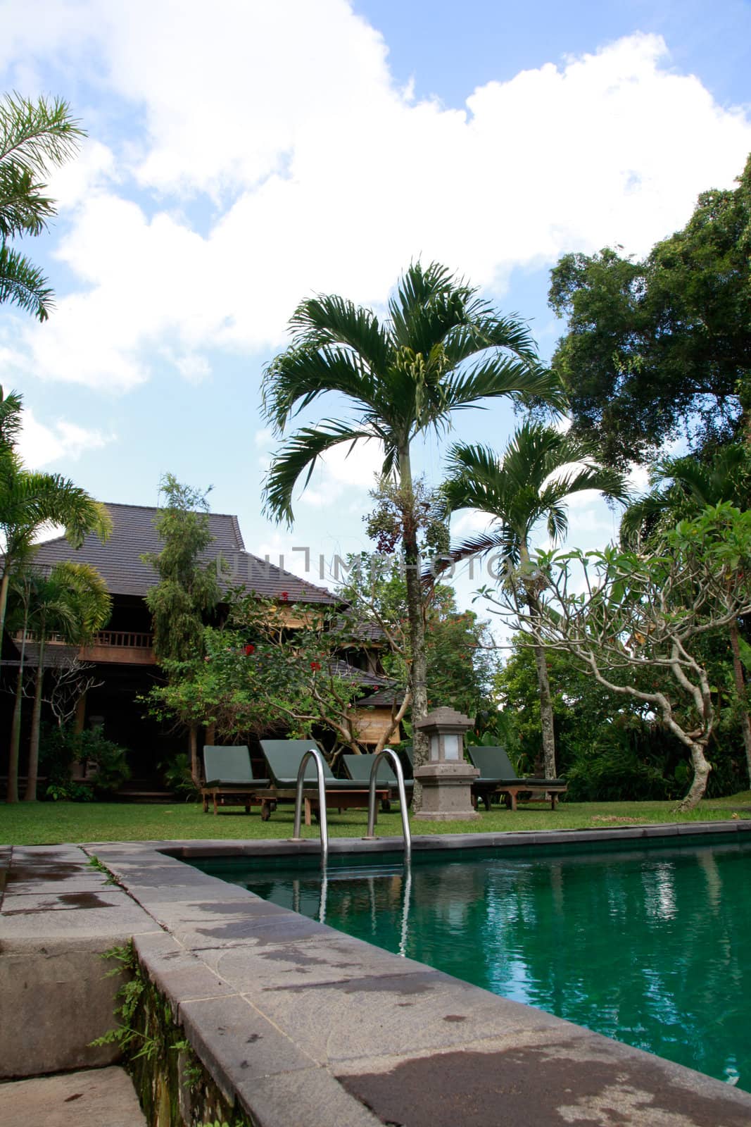 Balinese cottage overlooking rice fields - travel and tourism.