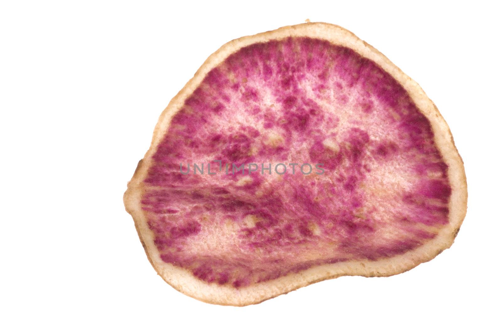 Isolated macro image of a sweet potato chip.