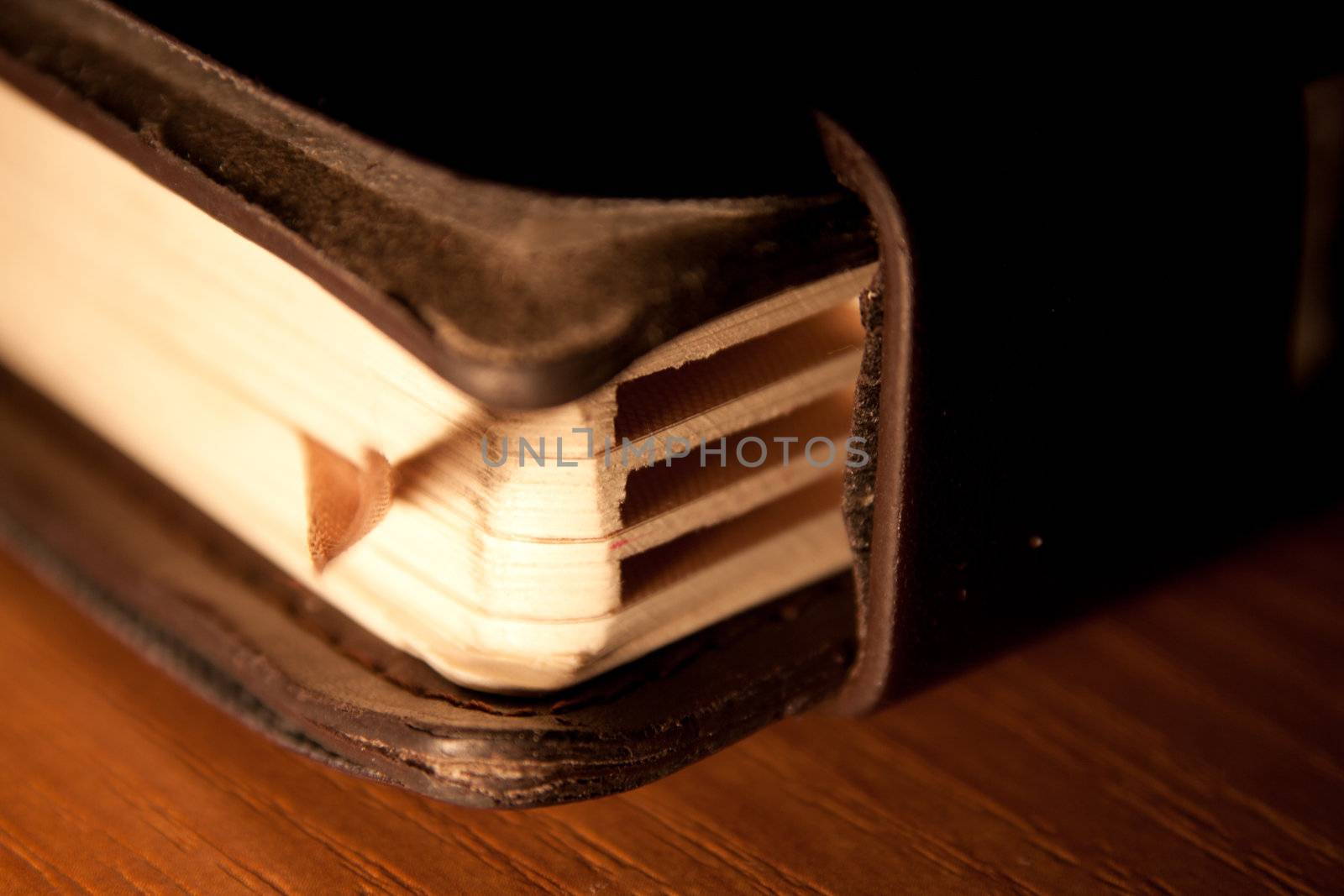 old vintage calendar or organizer lying on wooden table