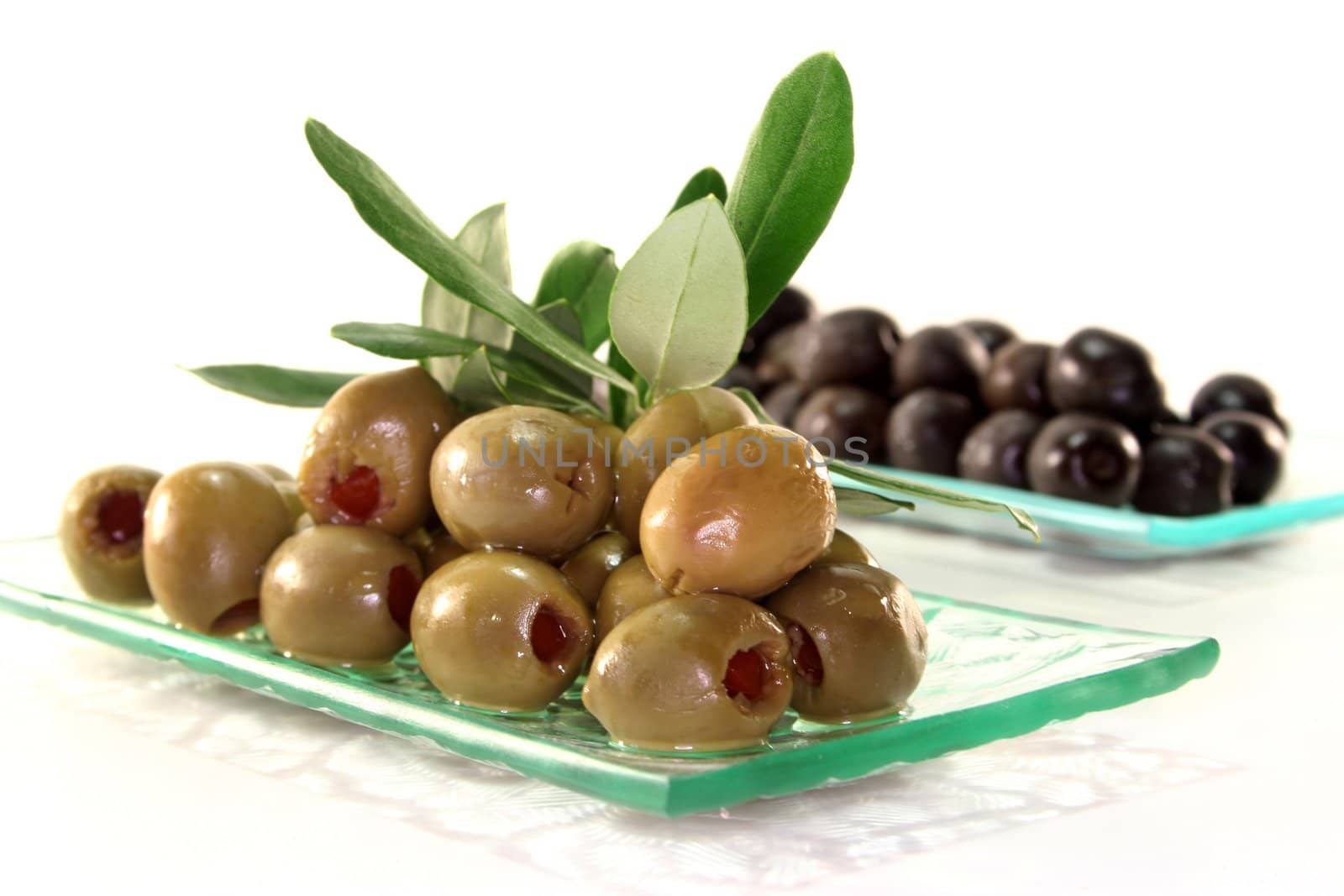 marinated green and black olives with olive branch