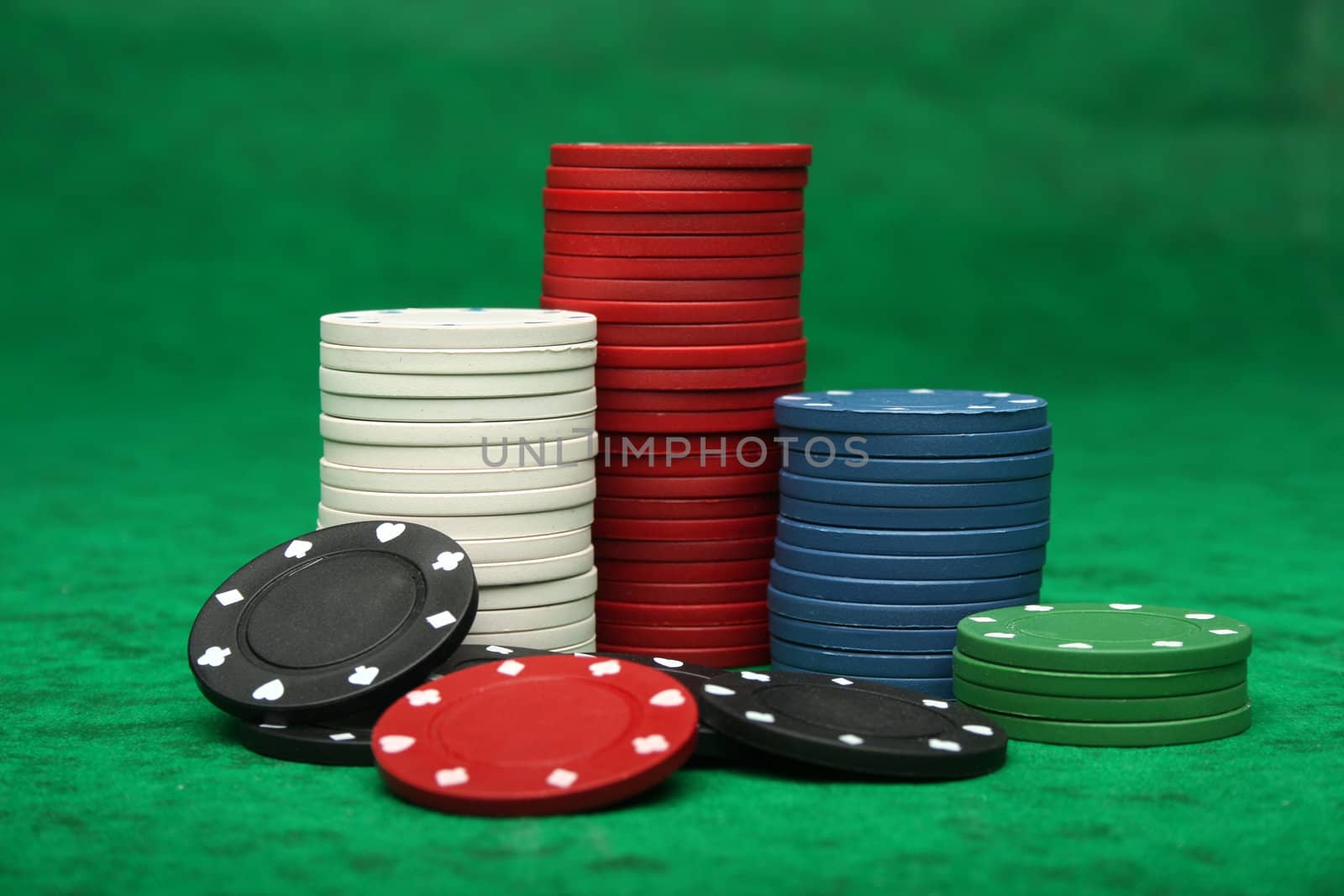 Gambling chips over green felt by Erdosain