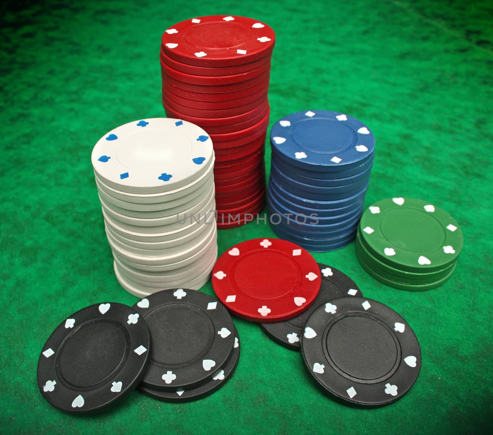 Gambling chips over green felt by Erdosain