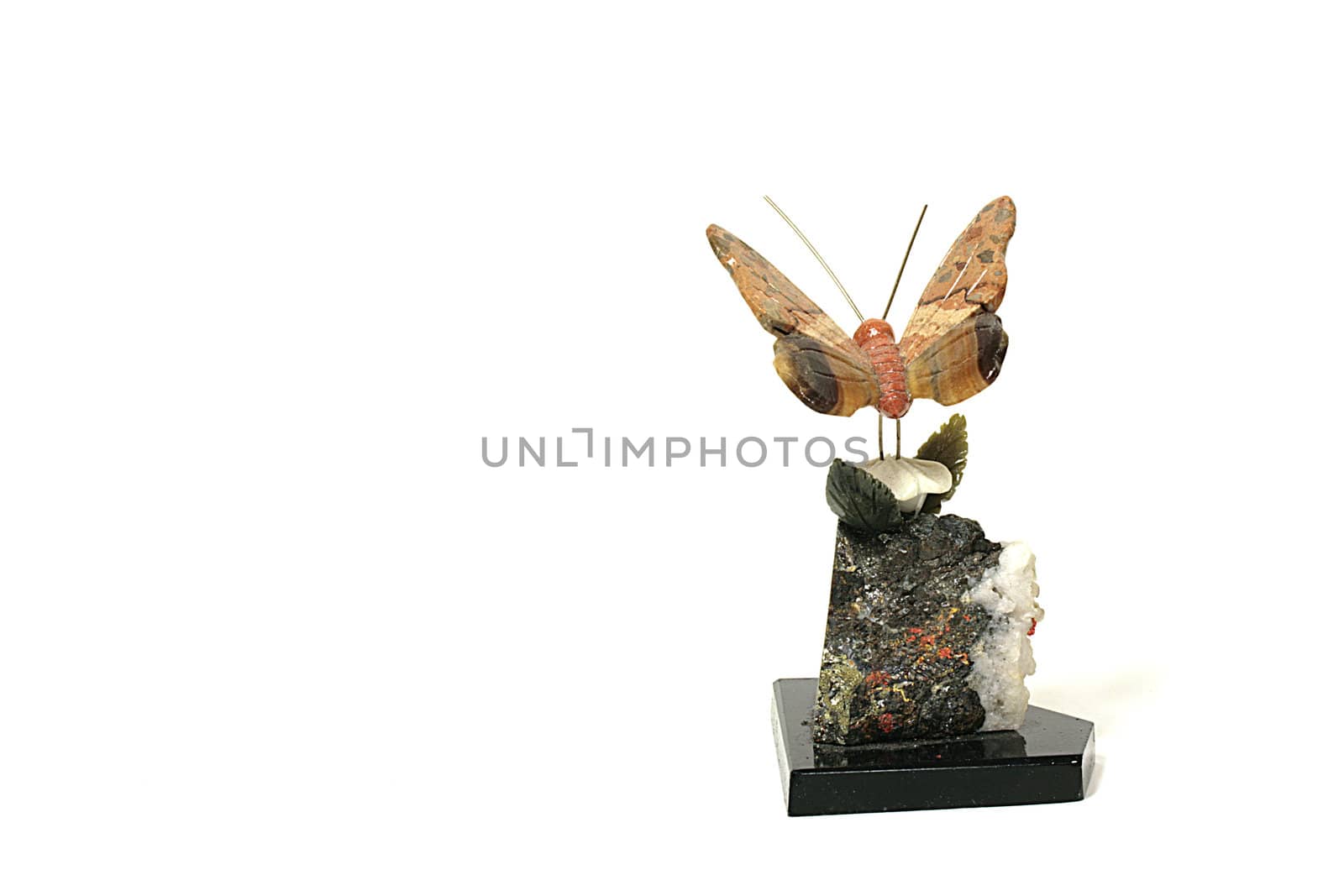 The decorative stone butterfly can be used in an interior.