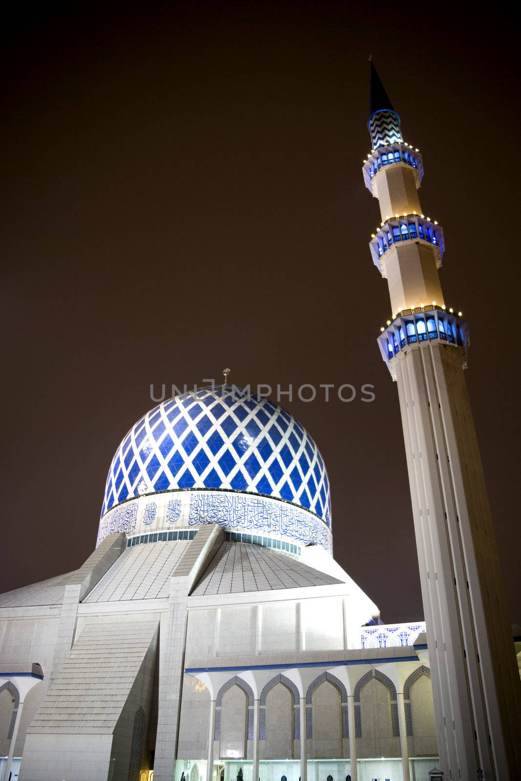 Night image of Sultan Salahuddin Abdul Aziz Shah Mosque or commonly known as the Blue Mosque, located at Shah Alam, Selangor, Malaysia. 