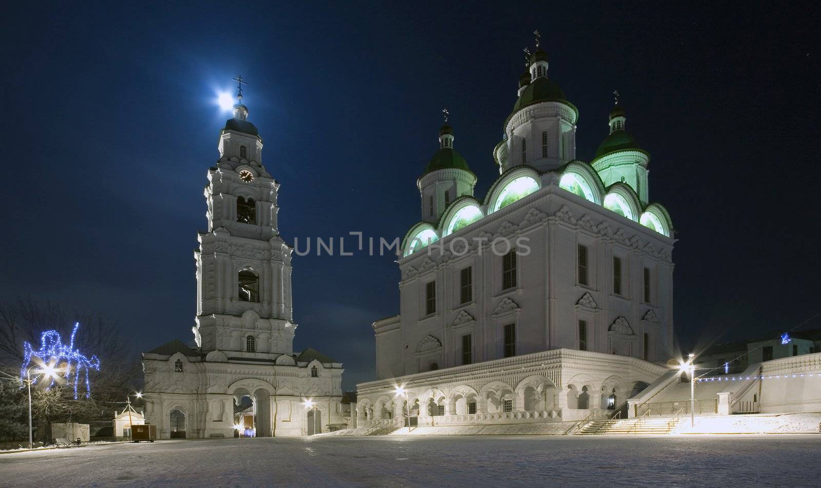Picture is very beautiful building, on a background of sky and clouds