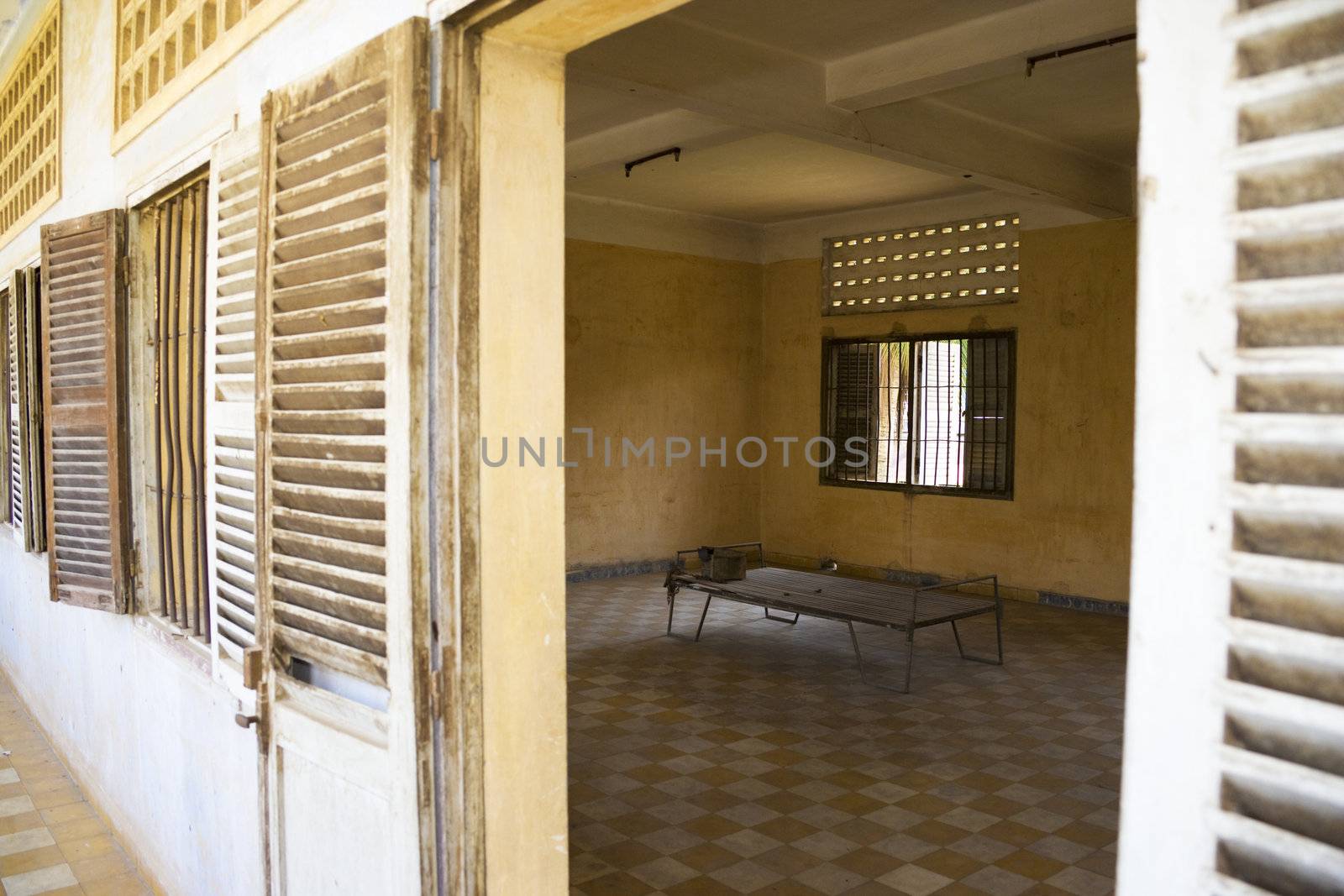 This is the actual room and the bed where many Cambodians were tortured and murdered by the Khmer Rouge. Formerly a school, converted into what was known as the notorious Security Prison 21 (S-21). About 17,000 people were interned here and only 12 survived. Now part of the Tuol Sleng Genocide Museum and it is in the same condition as when it was found by the liberating Vietnamese forces.