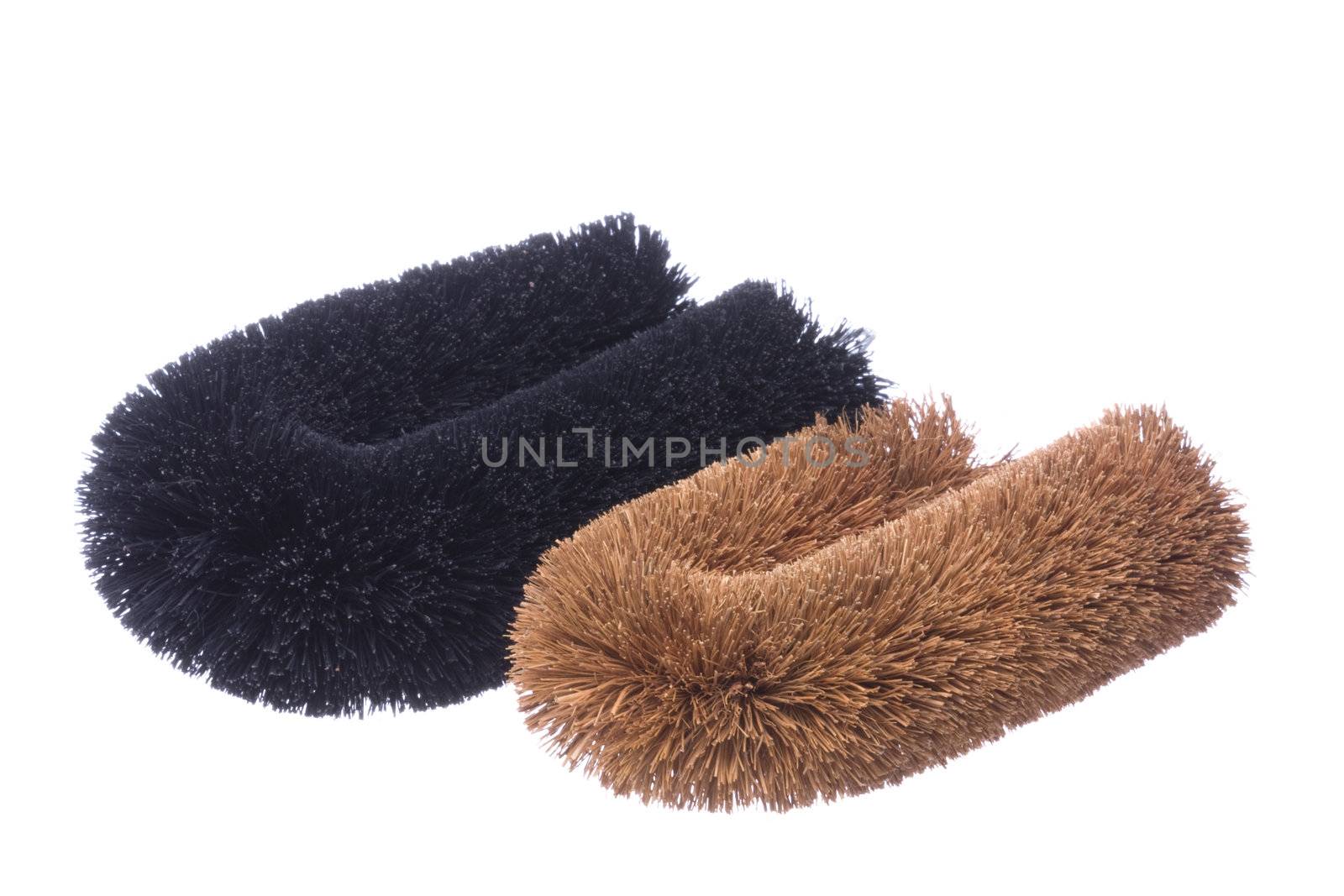 Isolated image of laundry washing brushes.