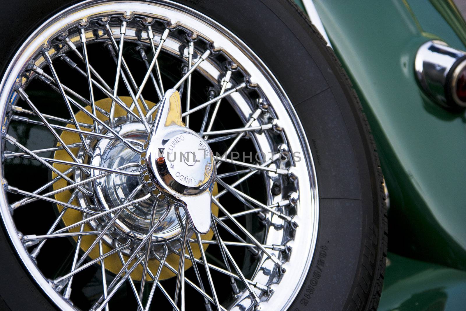 Image of a vintage car spare wheel.