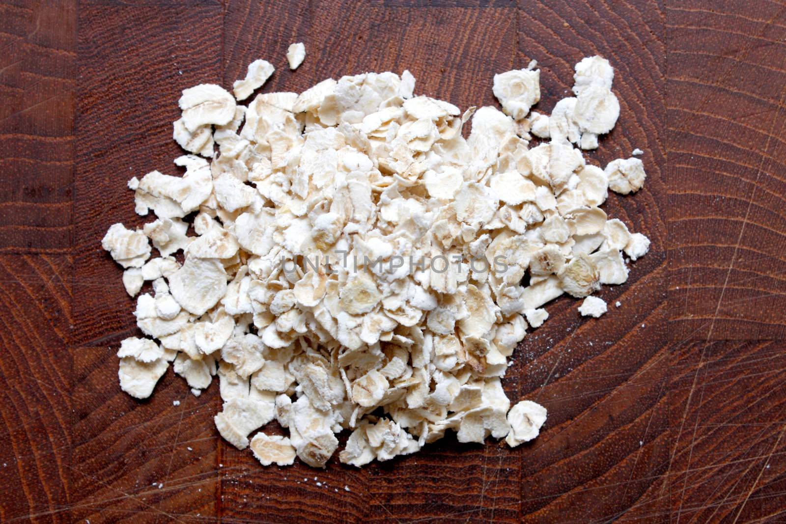 Oats in a heap isolated on white