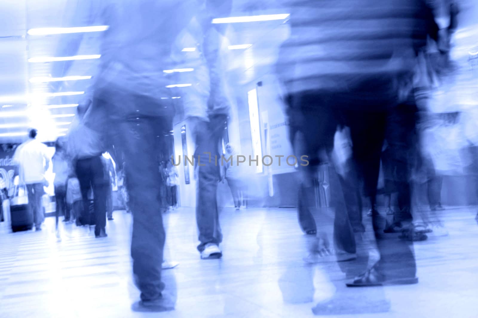 motion blurred of people walking in subway

