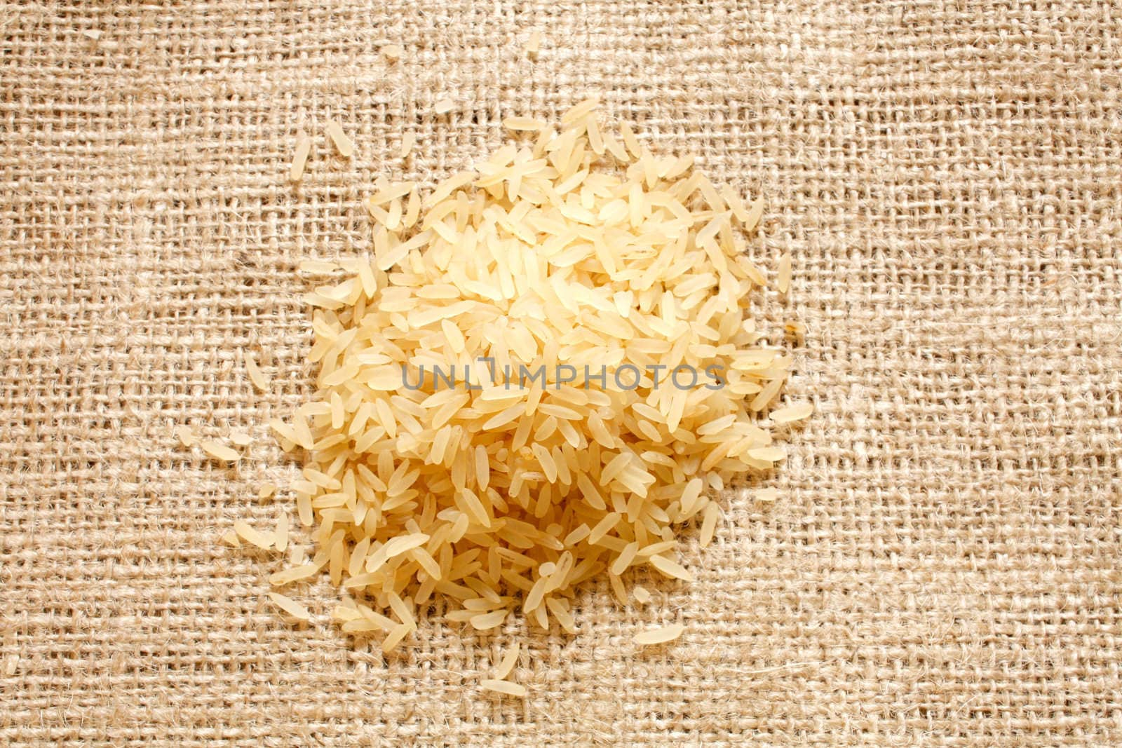 Parboiled rice on a texture background