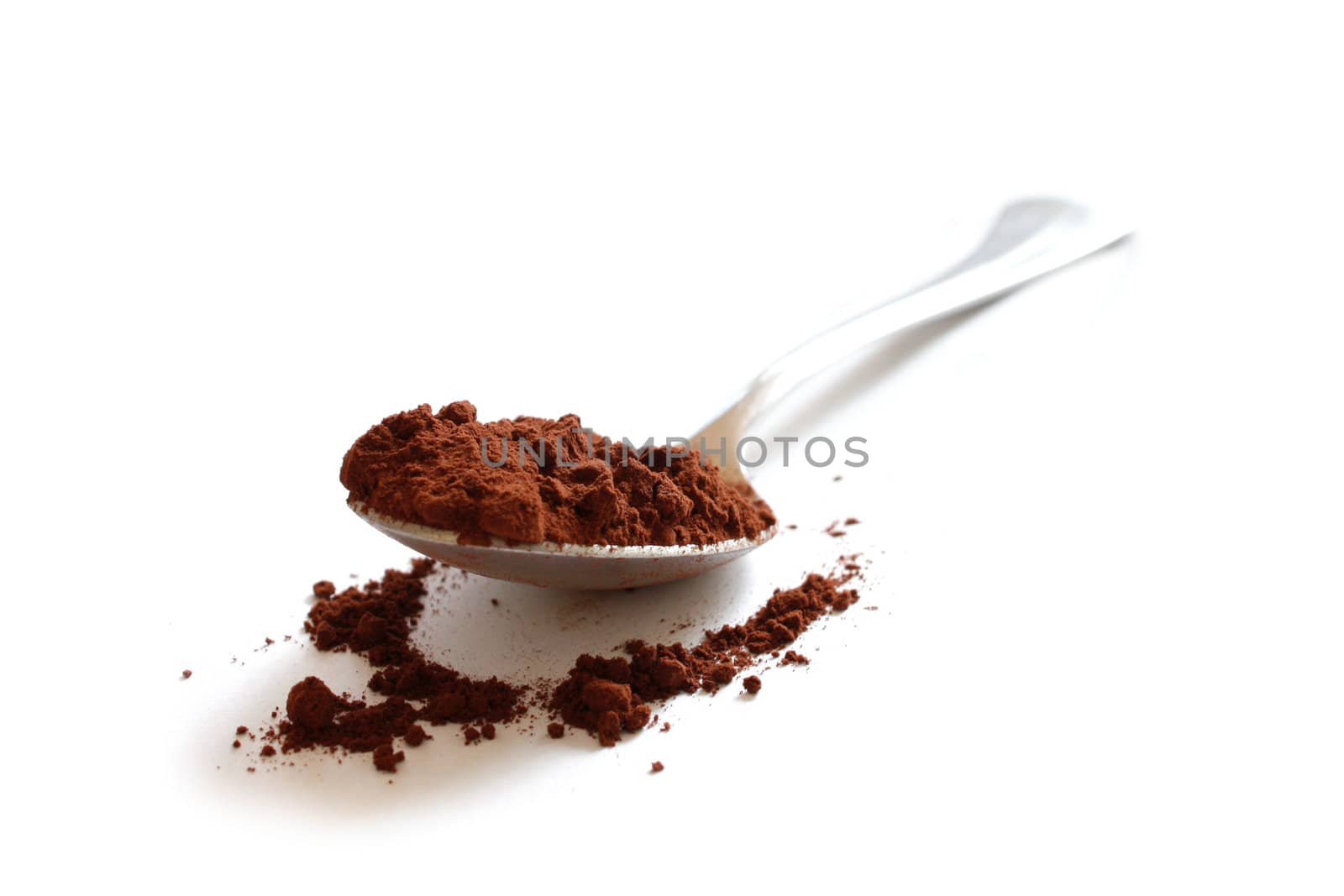 Cocoa powder isolated on white