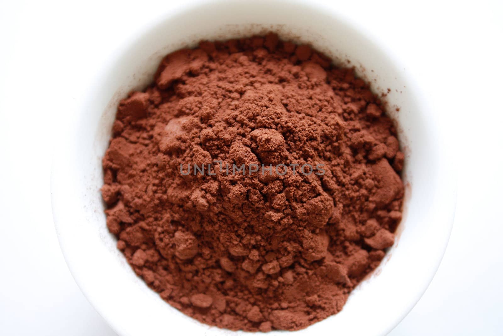 Cocoa powder isolated on white