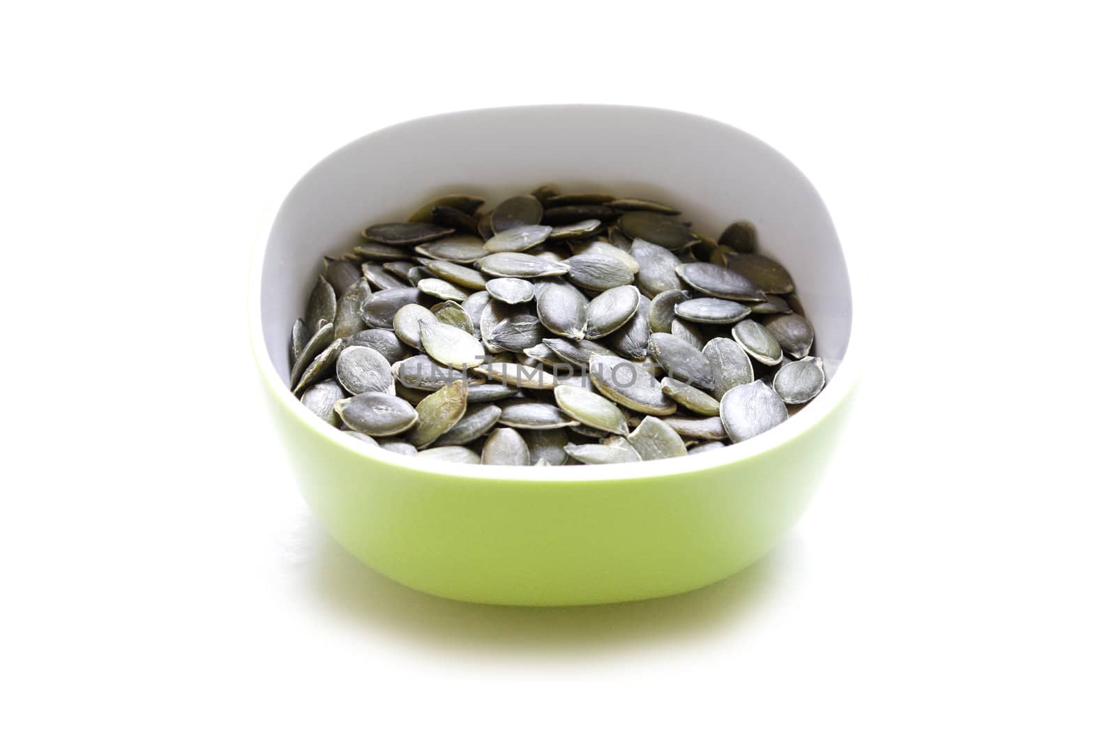 Pumpkin seeds on an isolated bg