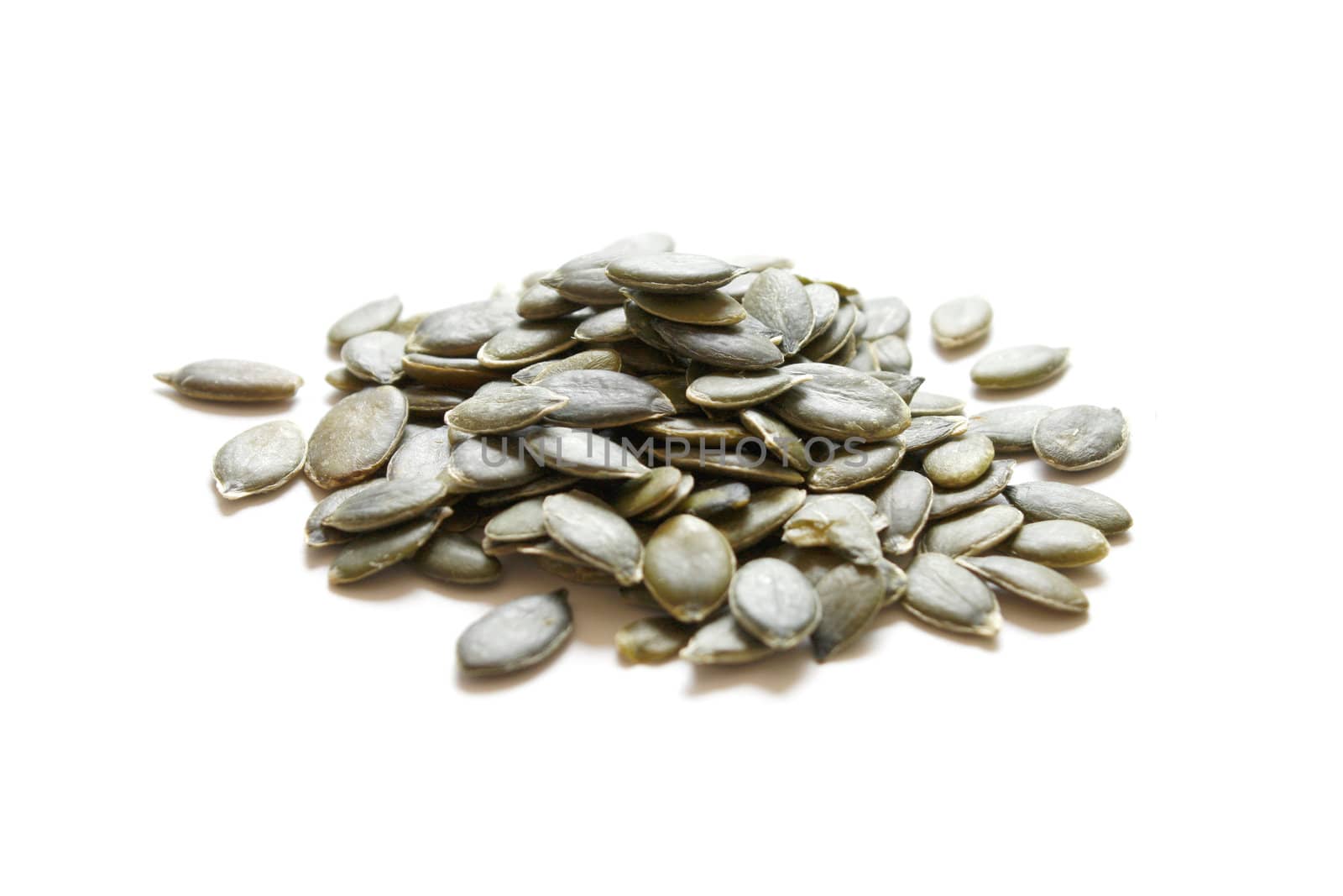 Pumpkin seeds on an isolated bg