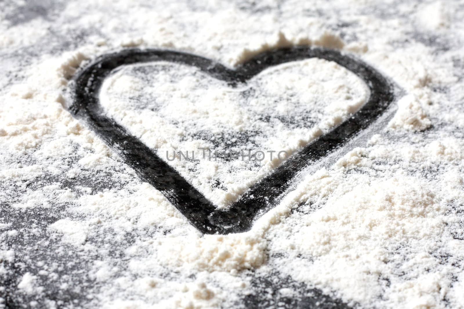 A love shape in white flour