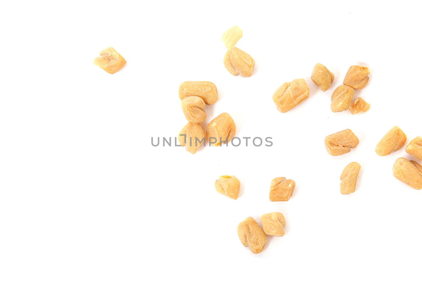 Fenugreek seeds isolated on white