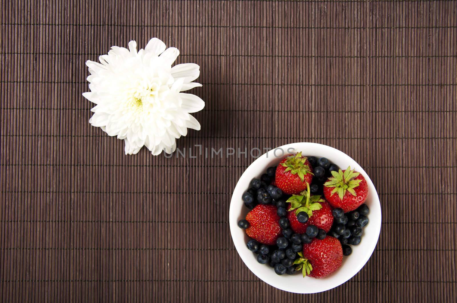 light Breakfast flower and Berries on a table by adam121