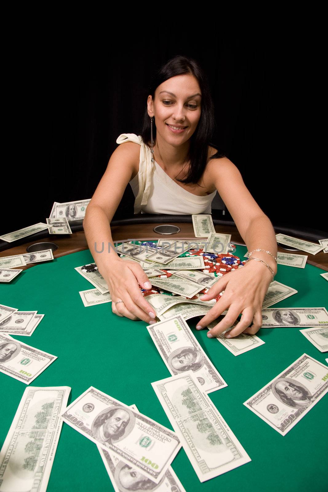 Pretty caucasian girl wins cash in Vegas casino