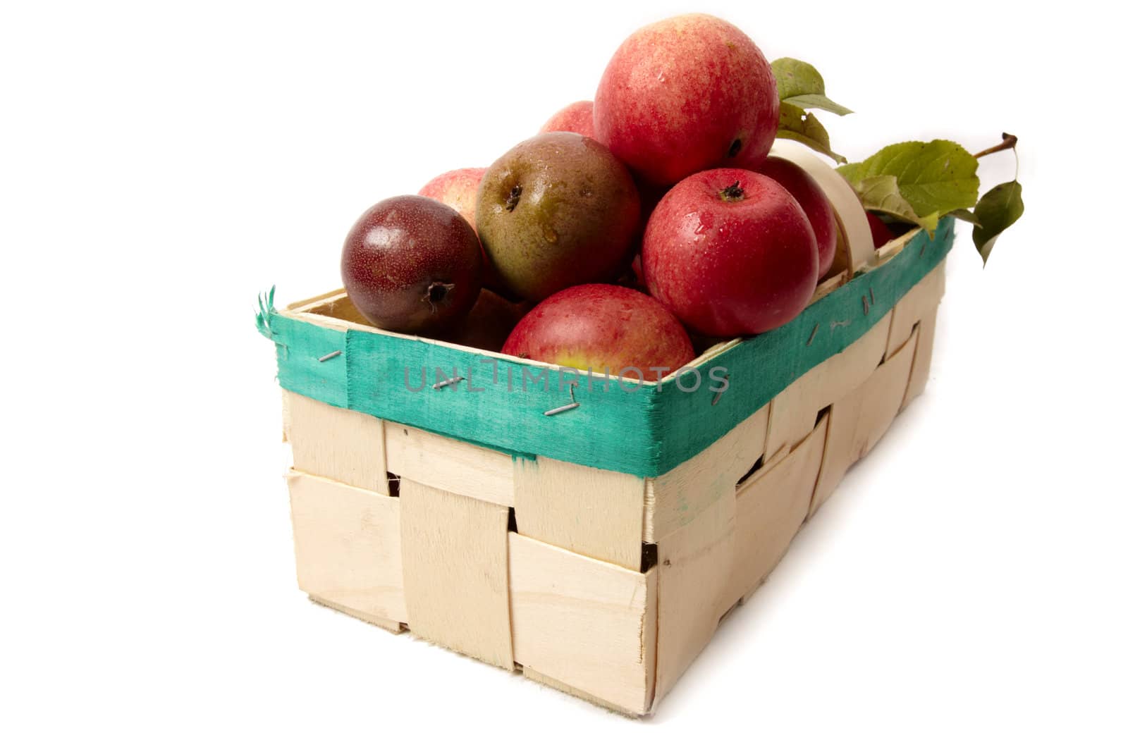 Basket with apple isolated on white background