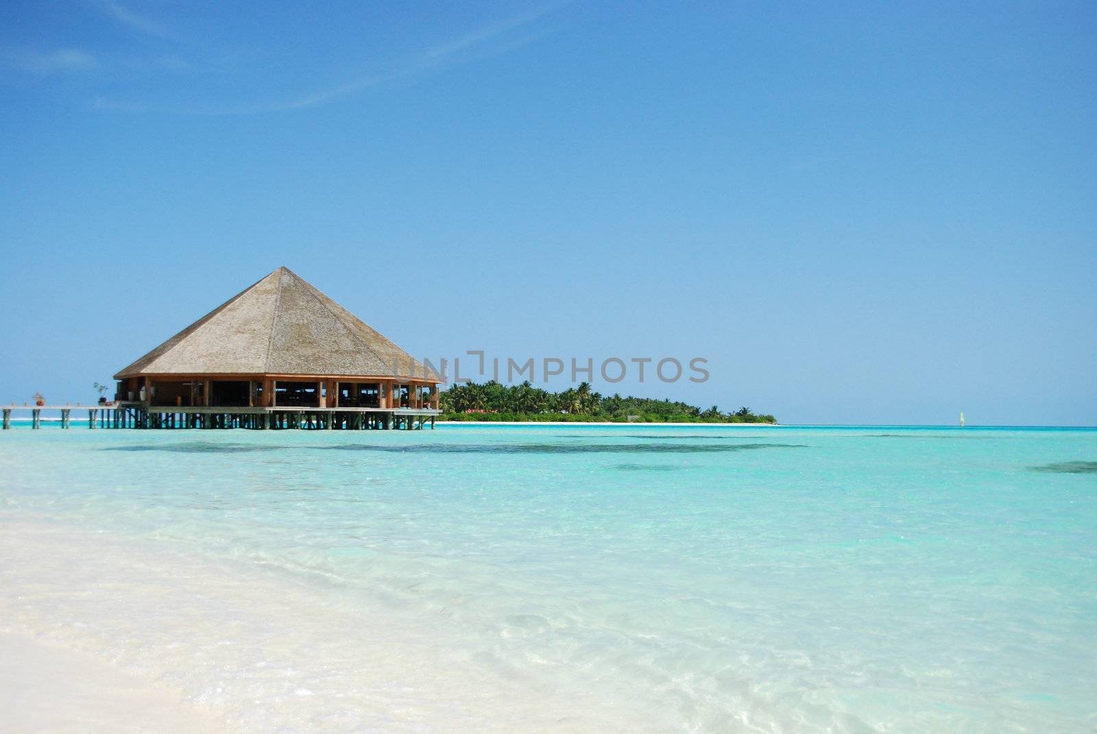 Bungalow's architecture and beach on a Maldivian Island by luissantos84