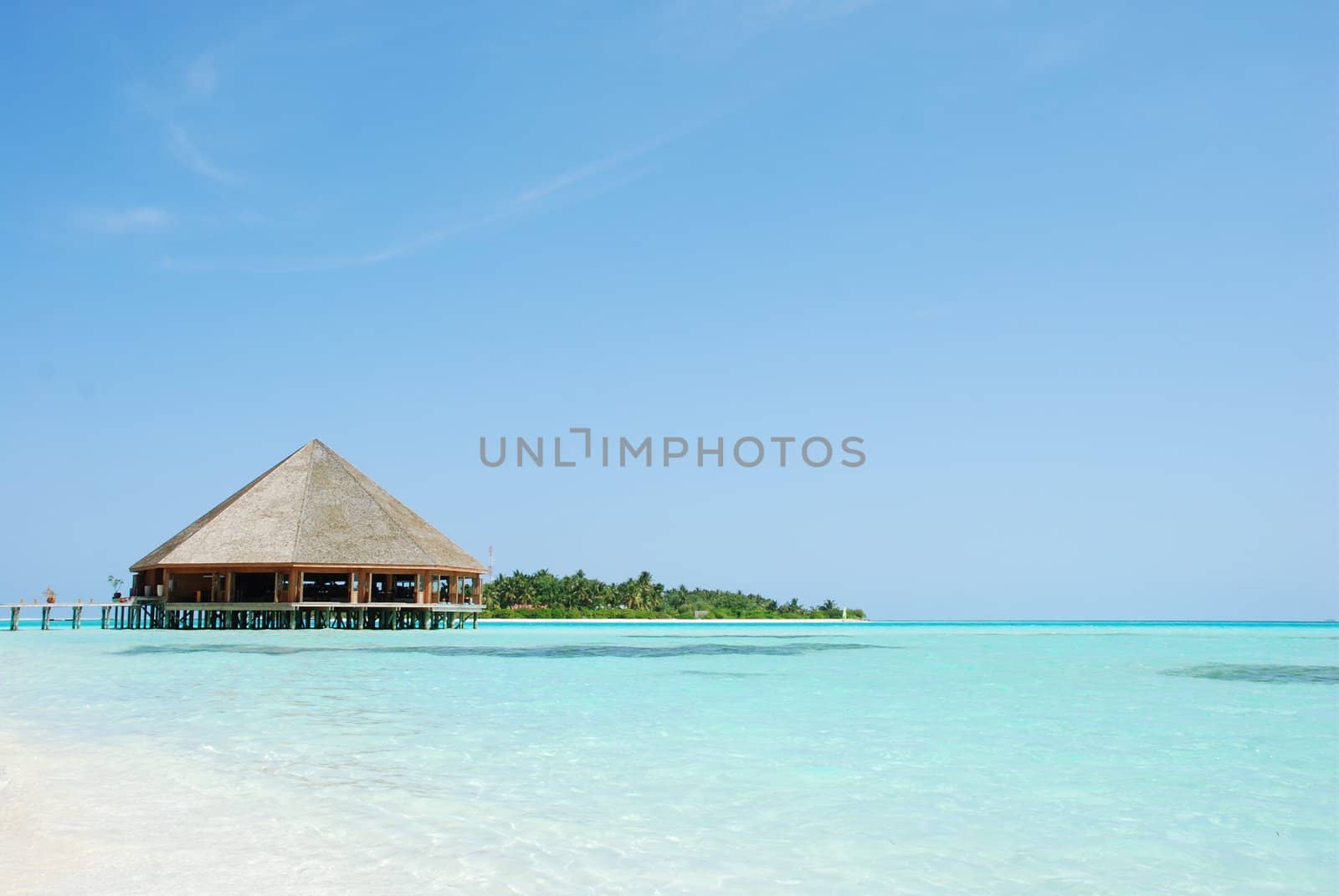 Bungalow's architecture and beach on a Maldivian Island by luissantos84