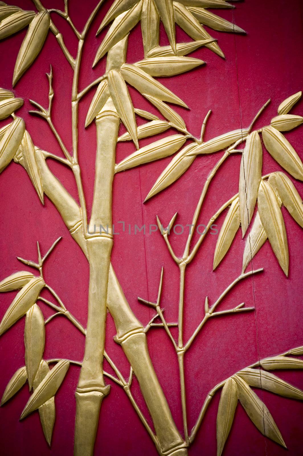 Bamboo carved on door. Symbol of longevity and friendship.
