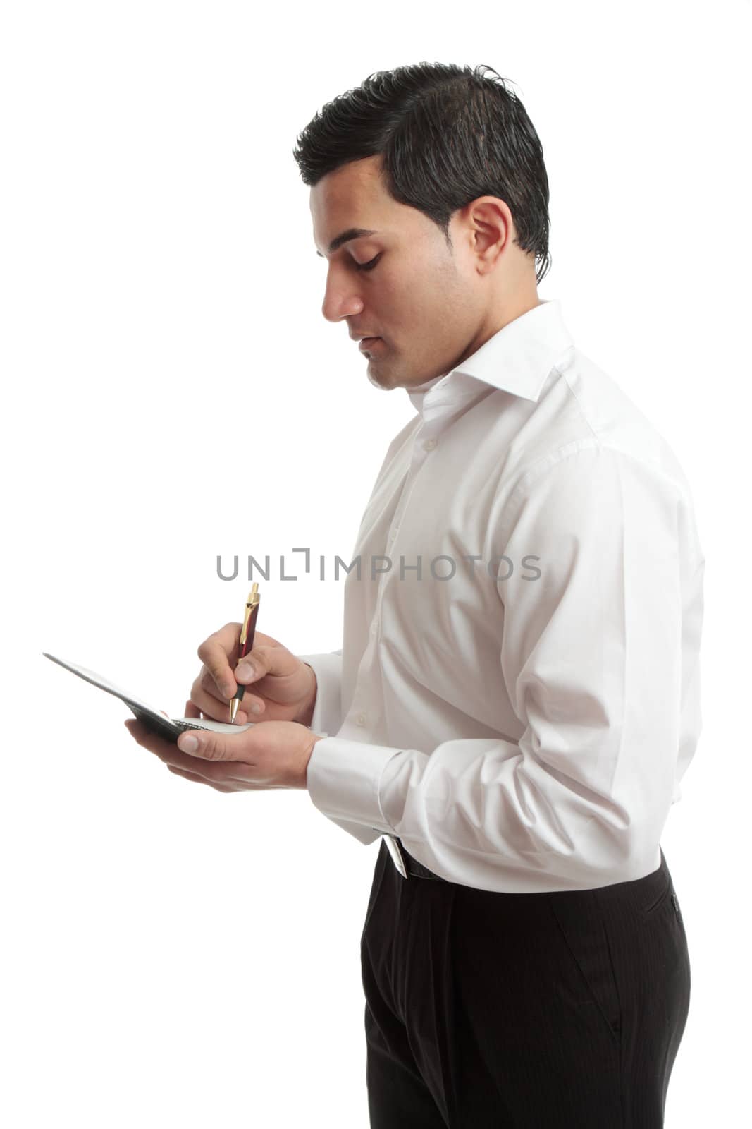 A businessman or waiter wriring in a notebook or taking an order.  White background.