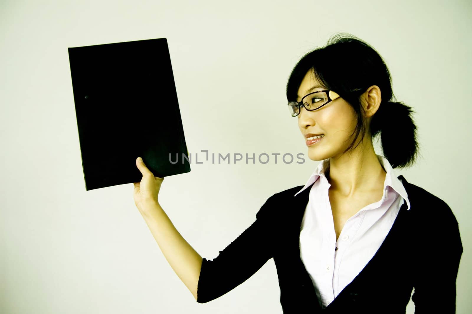 young women holding a file