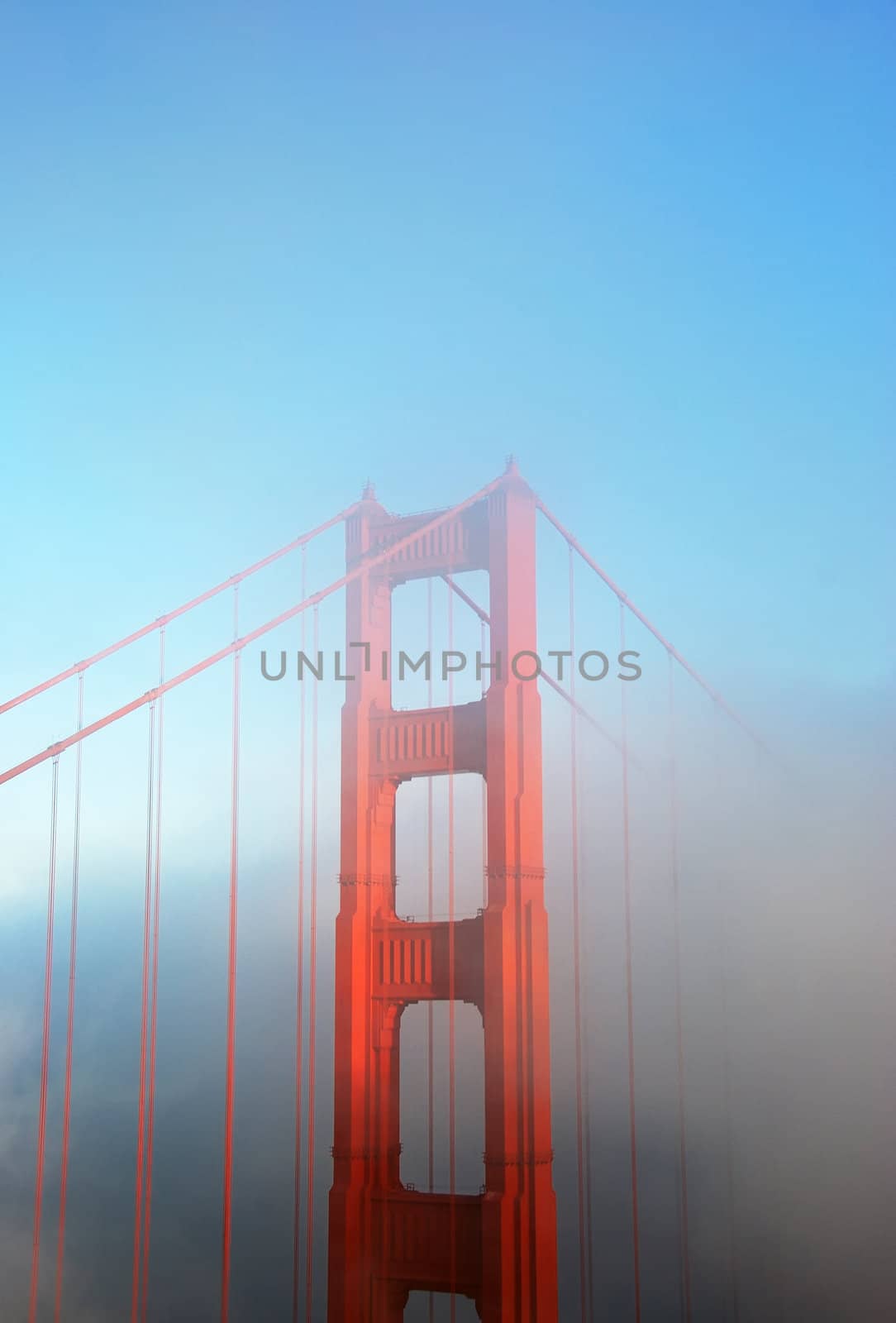 Detail of the Golden Gate Bridge in San Francisco on a foggy afternoon.
