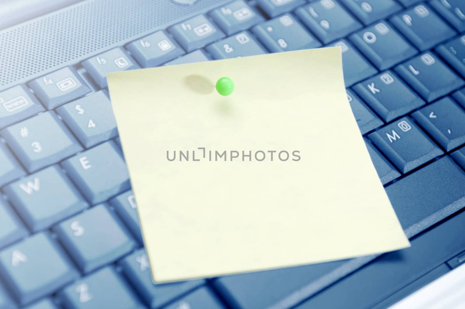 Sticky memo notes on keyboard