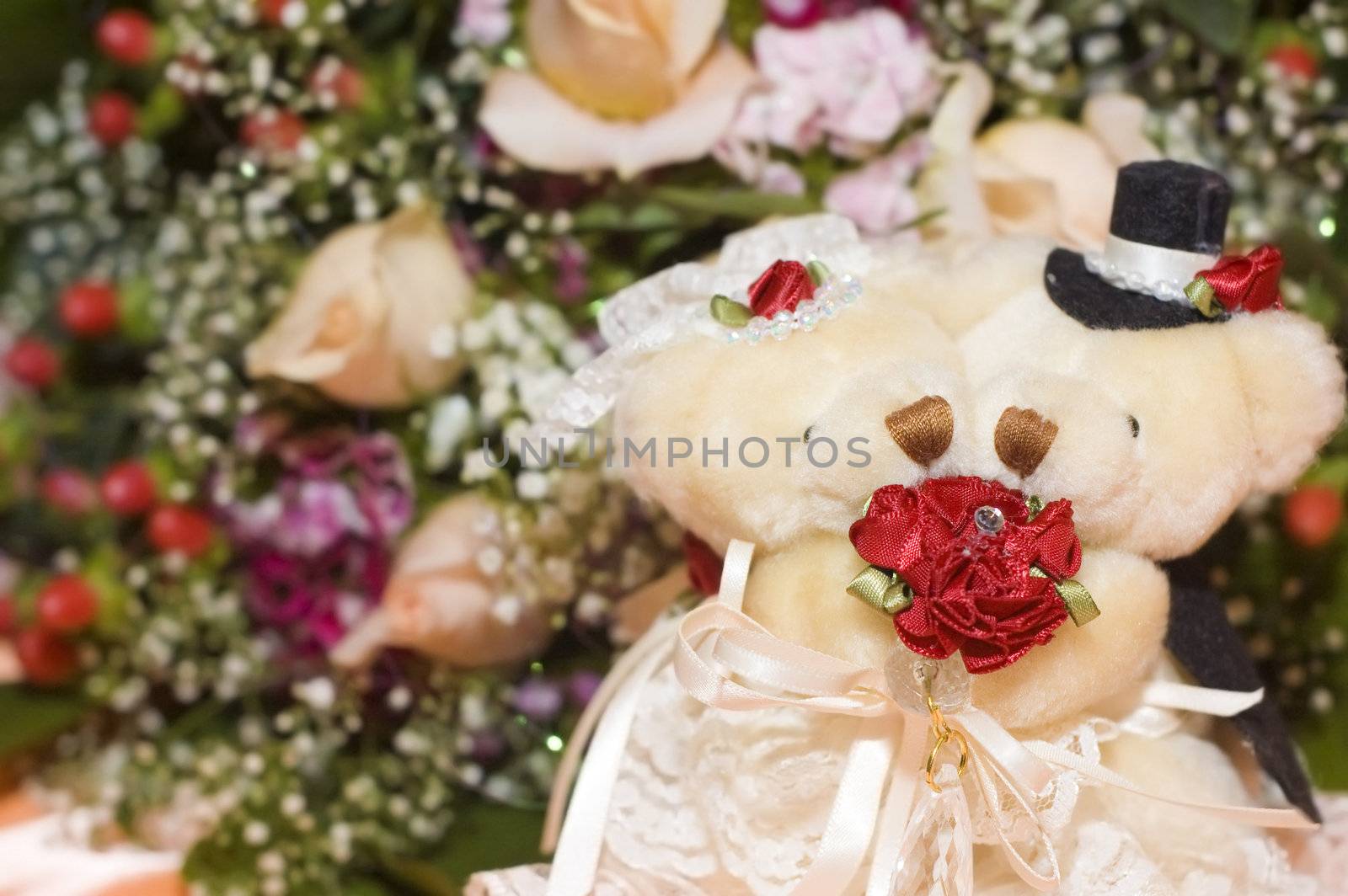 Wedding bears with flowers as background