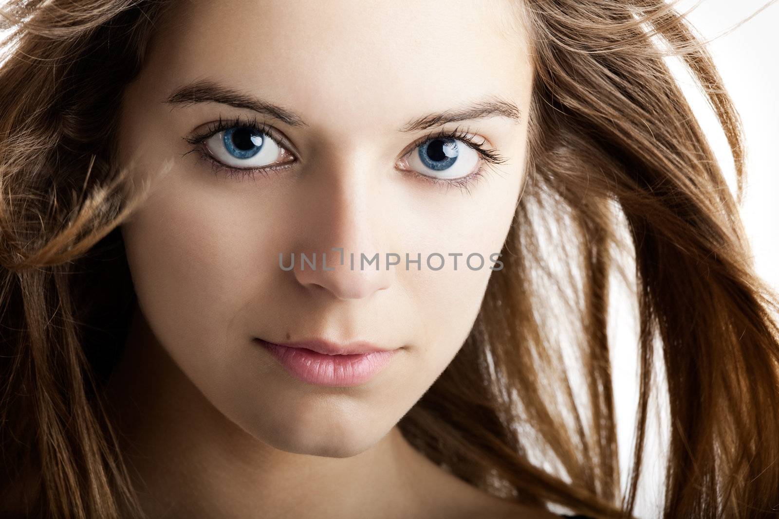 Close-up portrait of a fresh and beautiful young fashion model