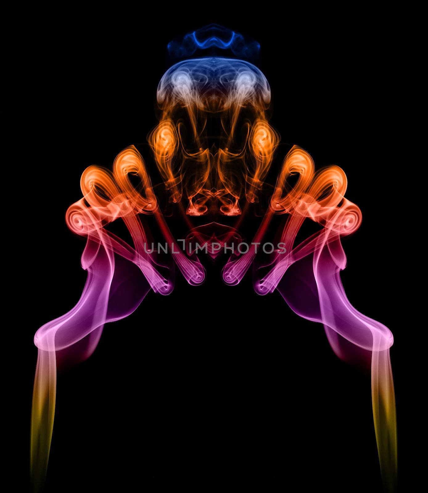 Symmetric colorful pattern created with smoke, it can be used well as an abstract background or blend.
