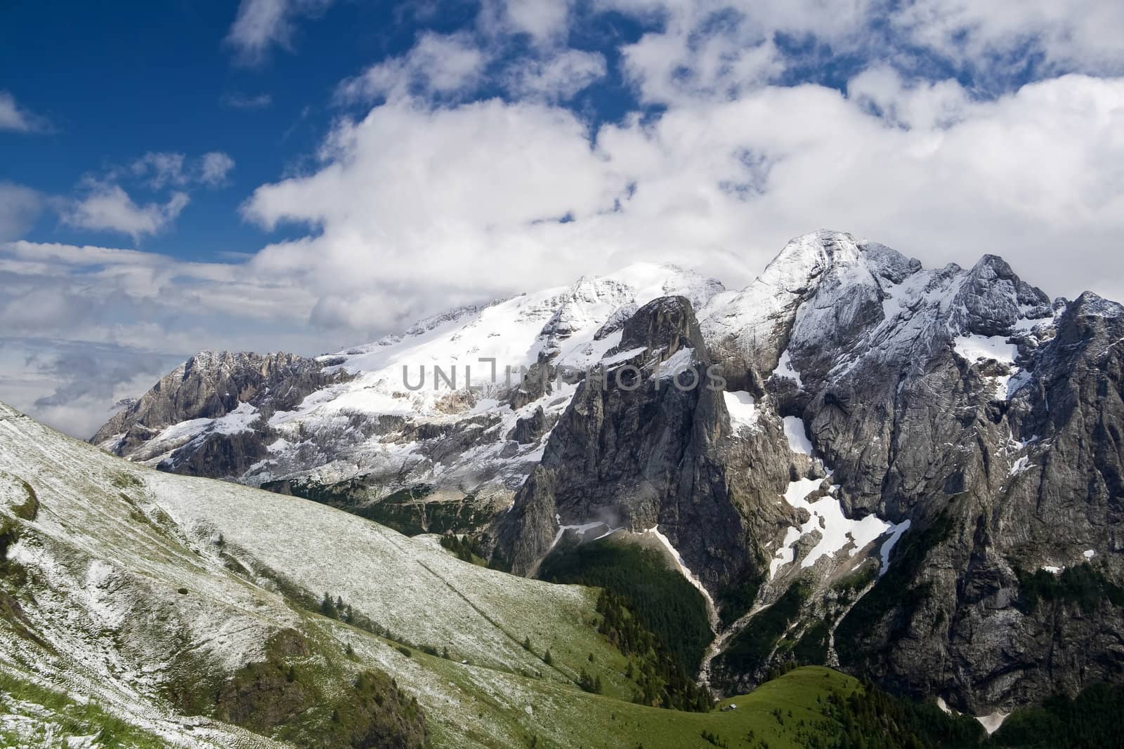 summer snow in Marmolada, famous dolomites mountain, Trentino, Italy. Photo taken with polarizer filter
