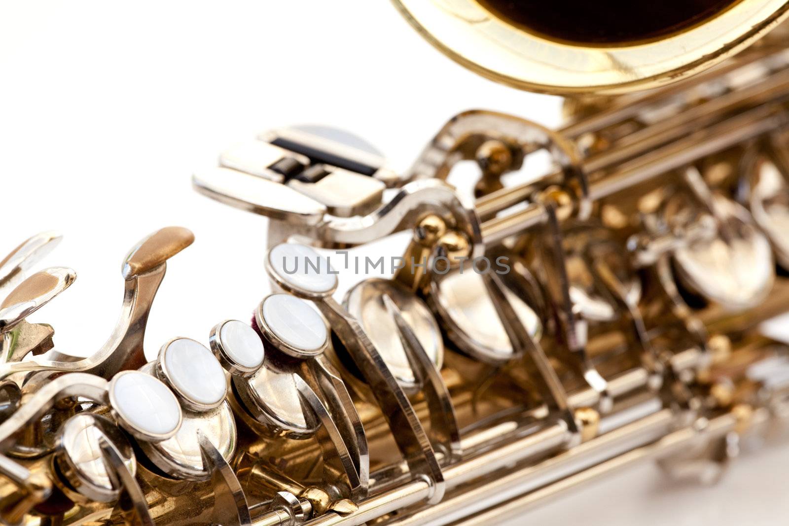 A saxaphone detail isolated on white
