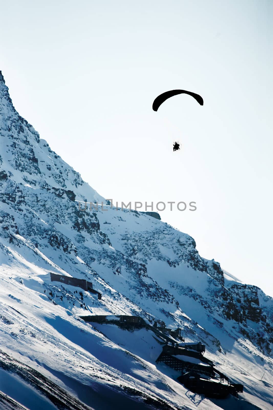 Paraglider over Mountain by leaf