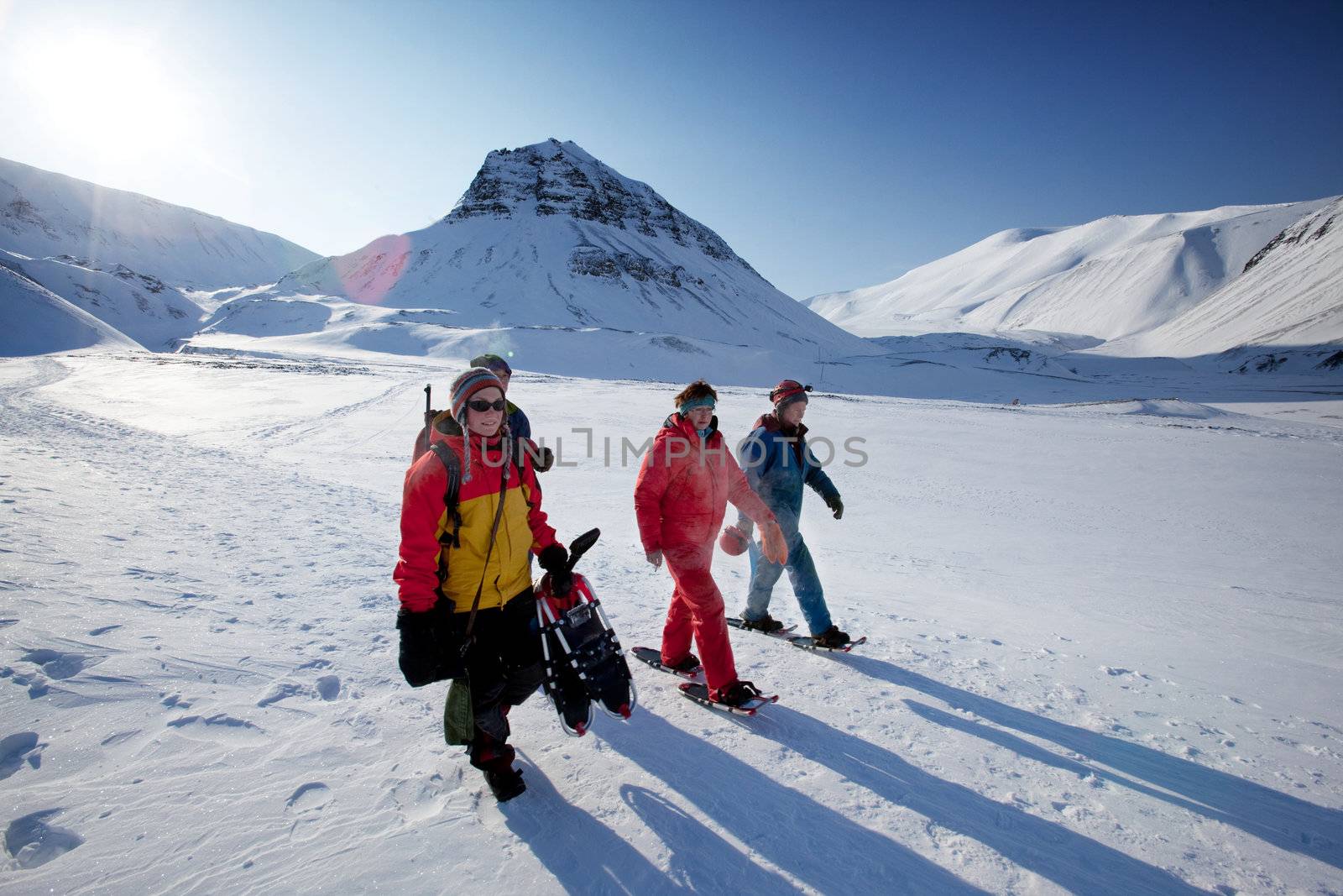 A group of tourists and a guide near Longyearbyen, Svalbard, Norway