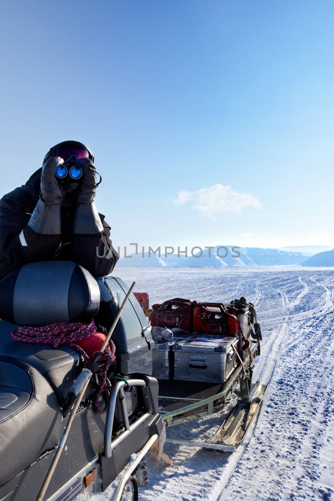 A winter adventure guide securing the area for dangerous wildlife