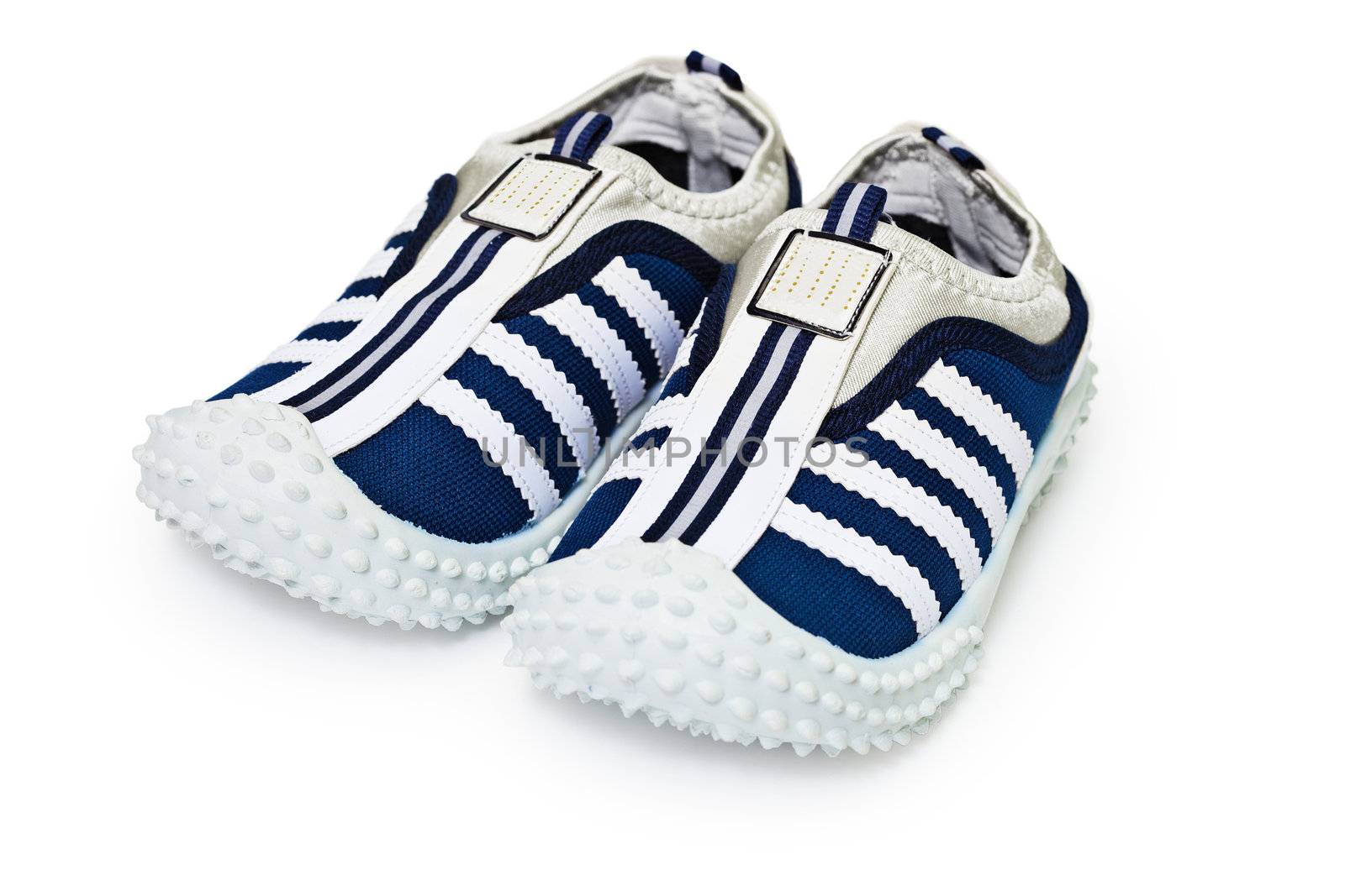 Sports inexpensive shoes on white by pzaxe