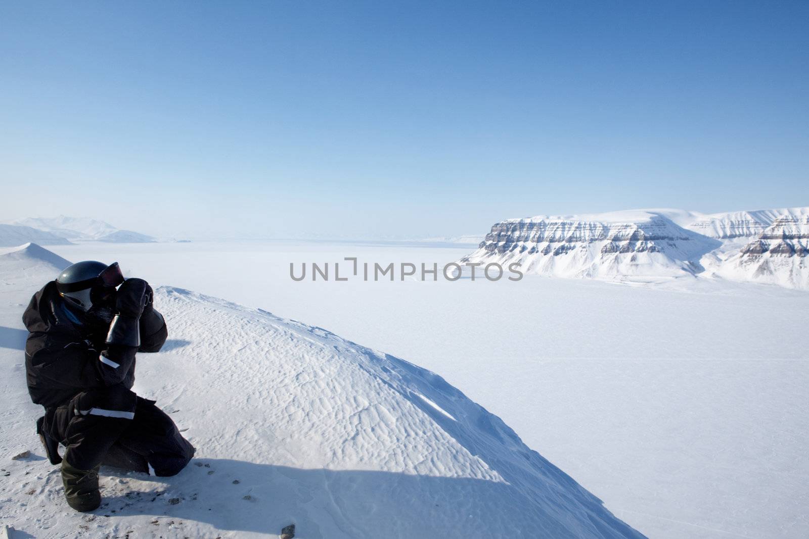 A winter wilderness adventure guide.  Spitsbergen, Svalbard, Norway