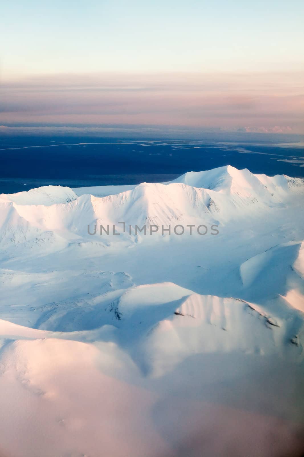 A mountain landscape filled with snow, Svalbard, Norway